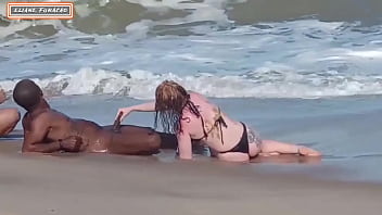 Amateur couple engages in public sex with a stranger at the beach, allowing both women to participate